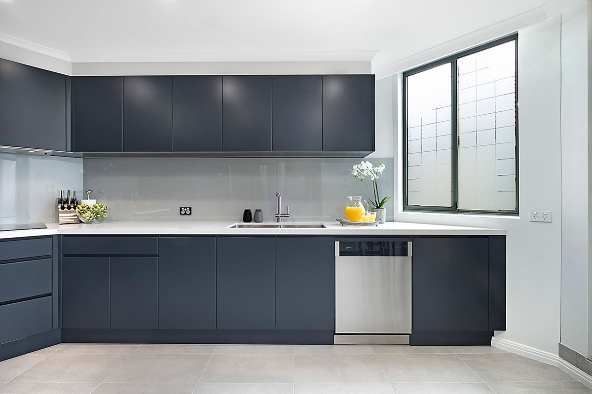 modern kitchen Dark cabinets with Caesarstone benchtops in Frosty Carina